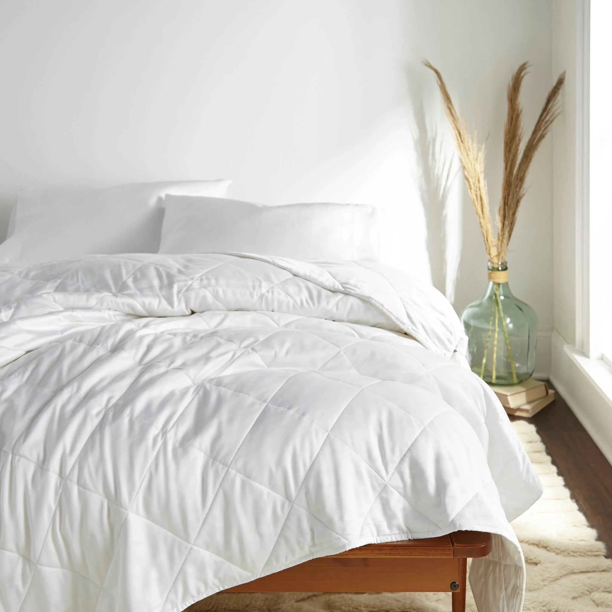 Bamboo duvet comforter on a white bed