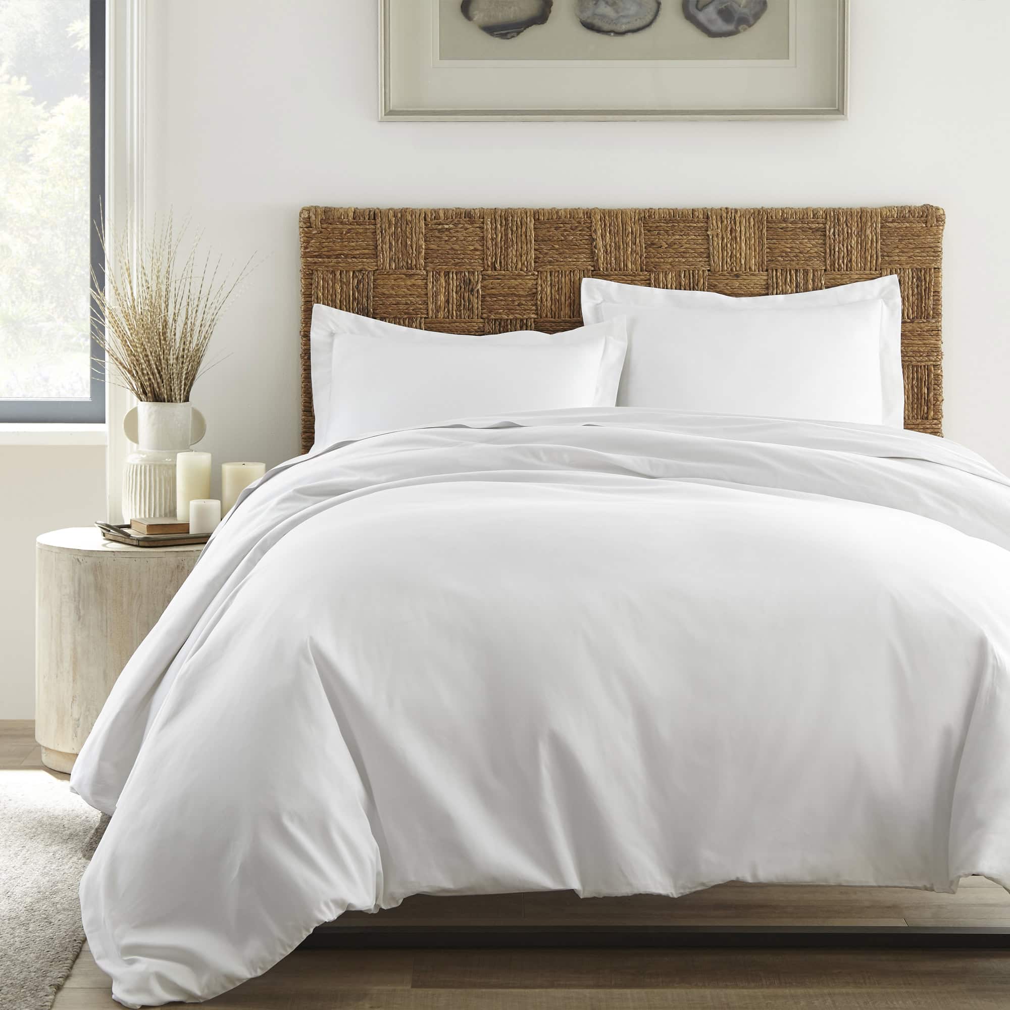 Organic cotton sateen duvet cover styled on a bed