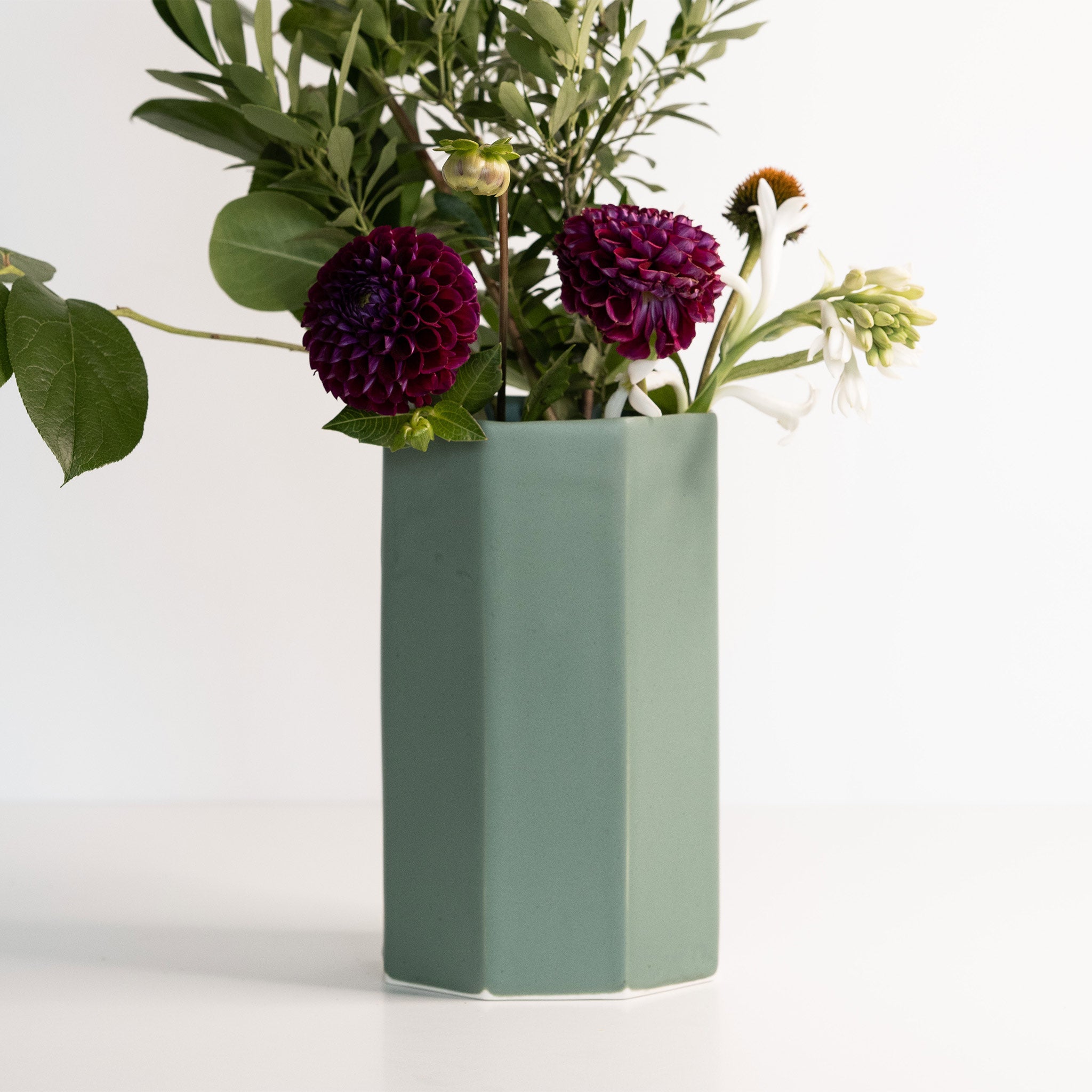 Handmade porcelain bouquet vase with flowers